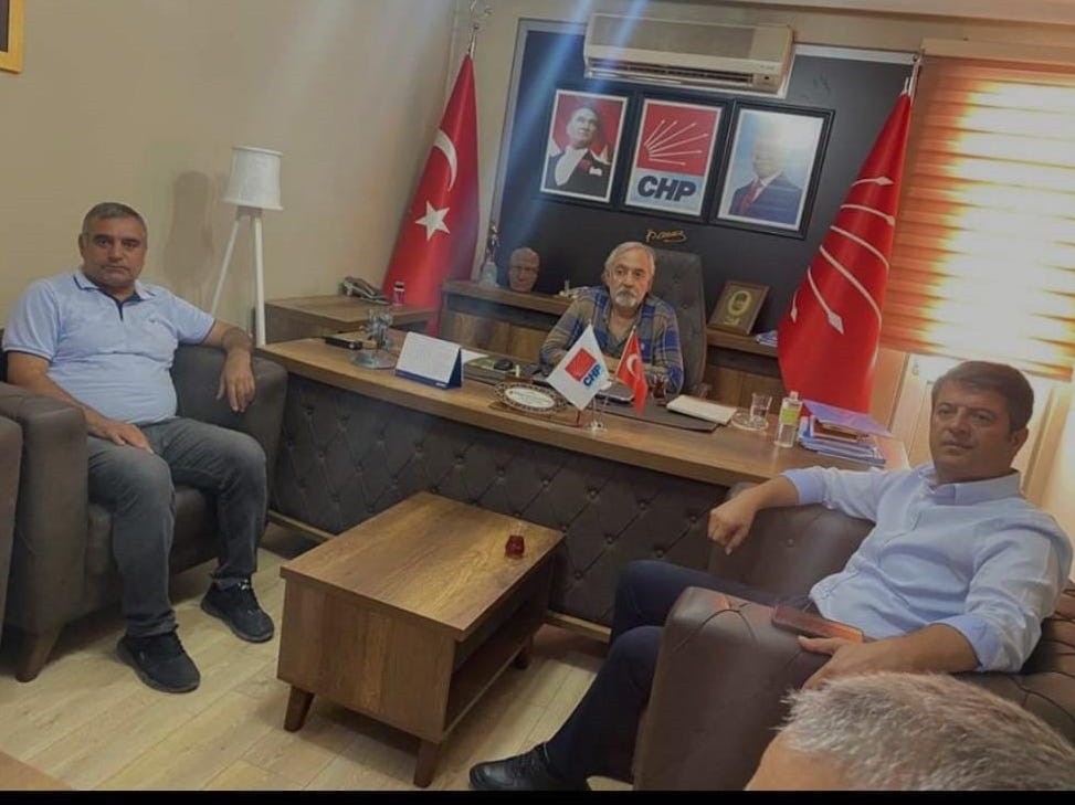 Başkan Binzet milletvekili ve merkez ilçe başkanını makamında ağırladı