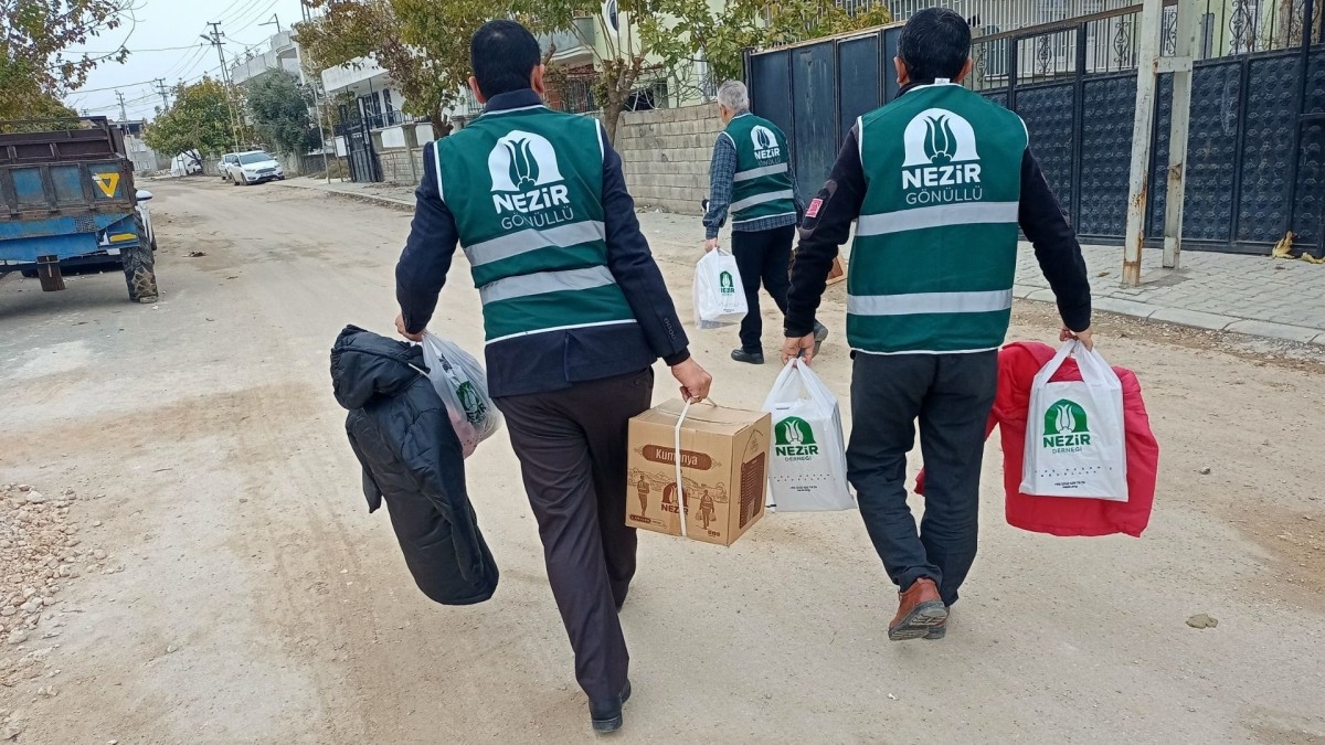 Adıyaman'da Nezir Derneği’nden kış desteği: Konteyner ve hanelere giyim yardımı